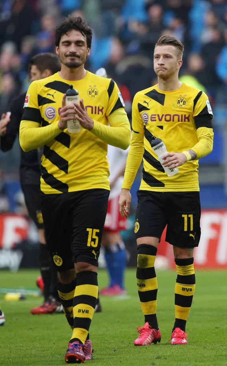 世俱杯-多特蒙德名宿现身球场,激励新一代球员